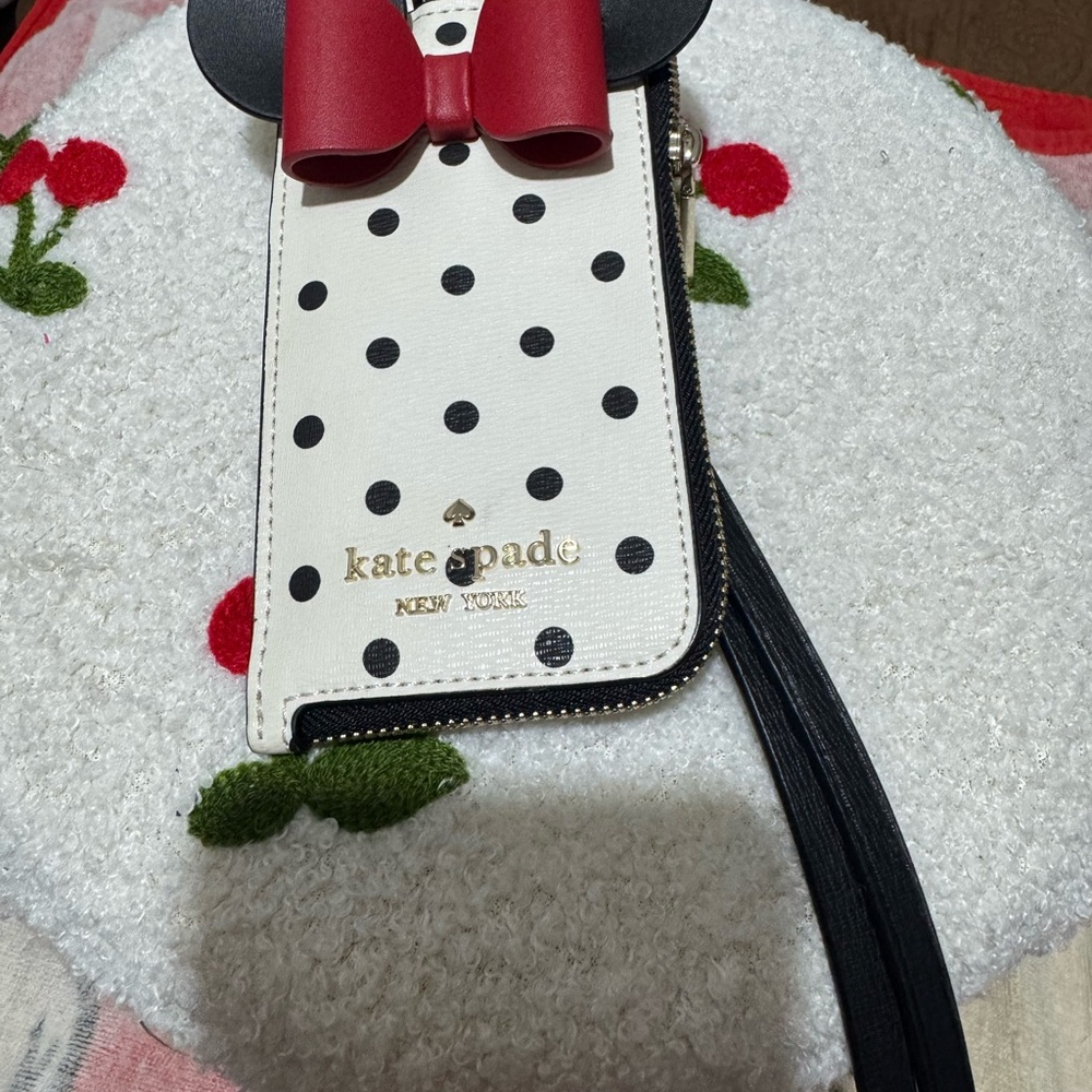 Kate Spade Black and White Polka Dot Wristlet with Red Bow